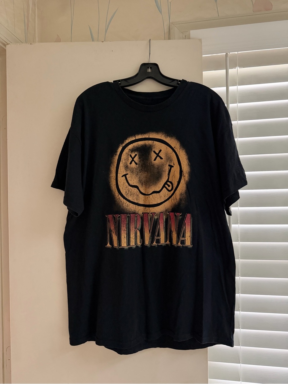NIRVANA Black Tee with Gold Smiley and Red Logo